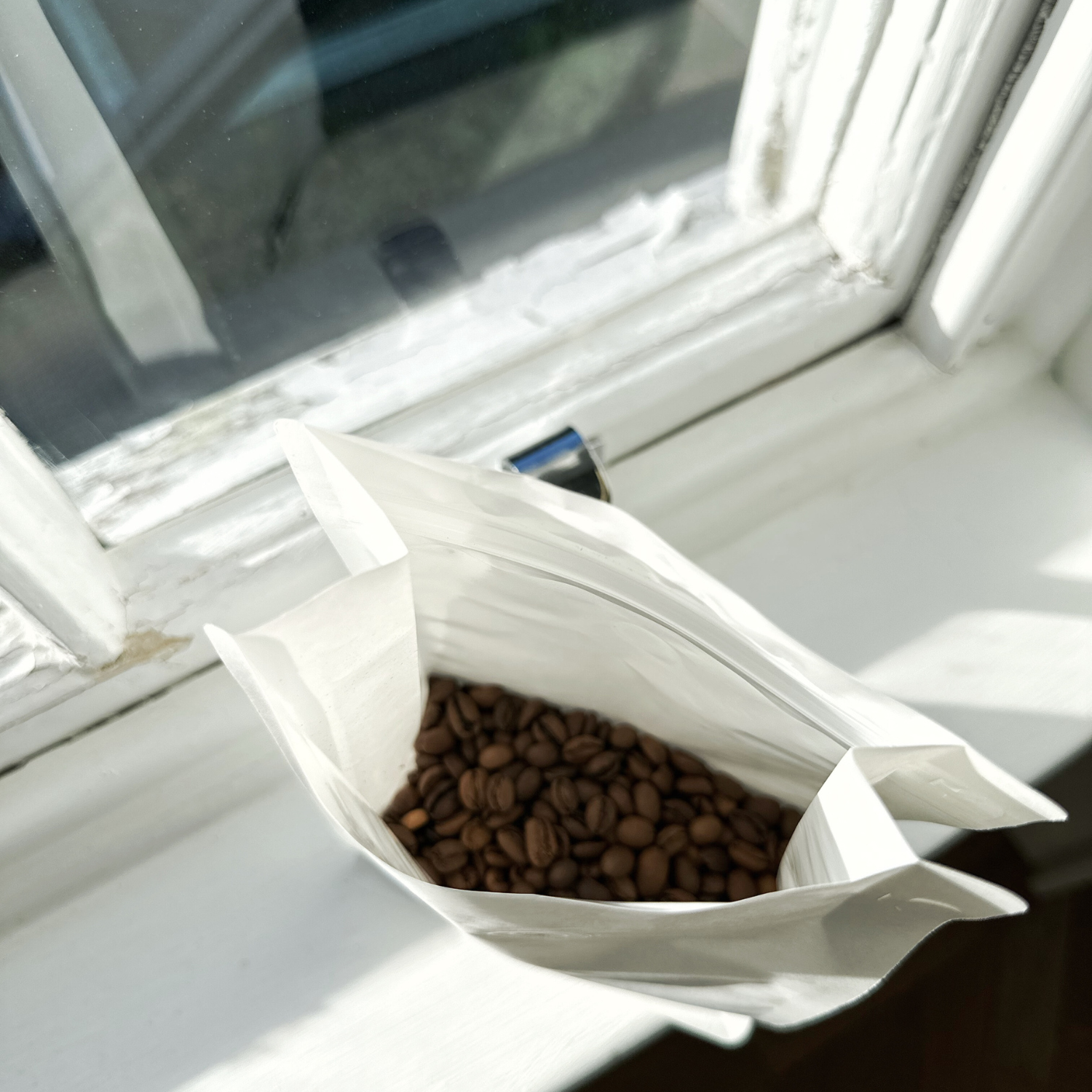 A bag of coffee roasted in a Small-Batch Coffee Roasting process